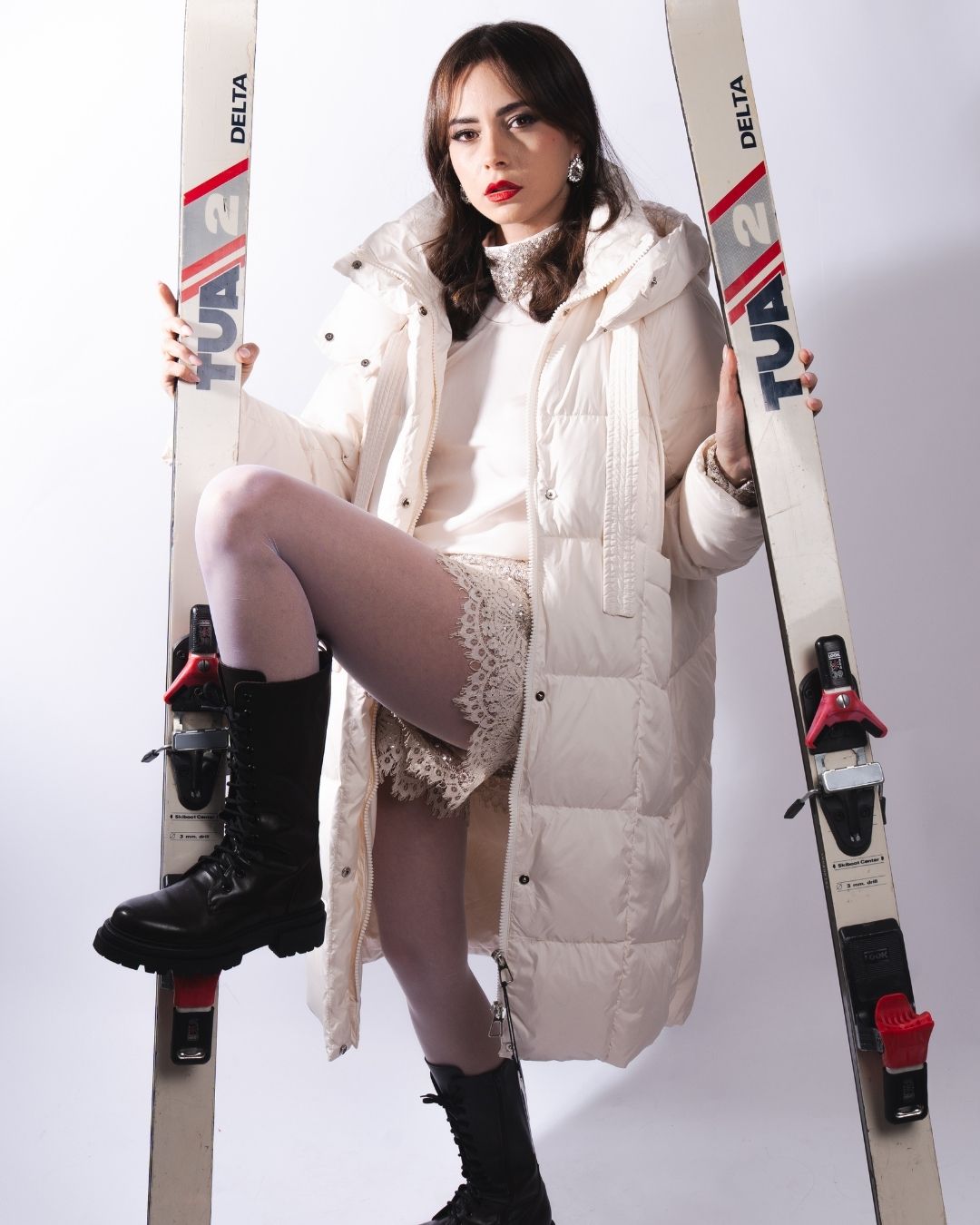 Giacca imbottita lunga con cappuccio ampio